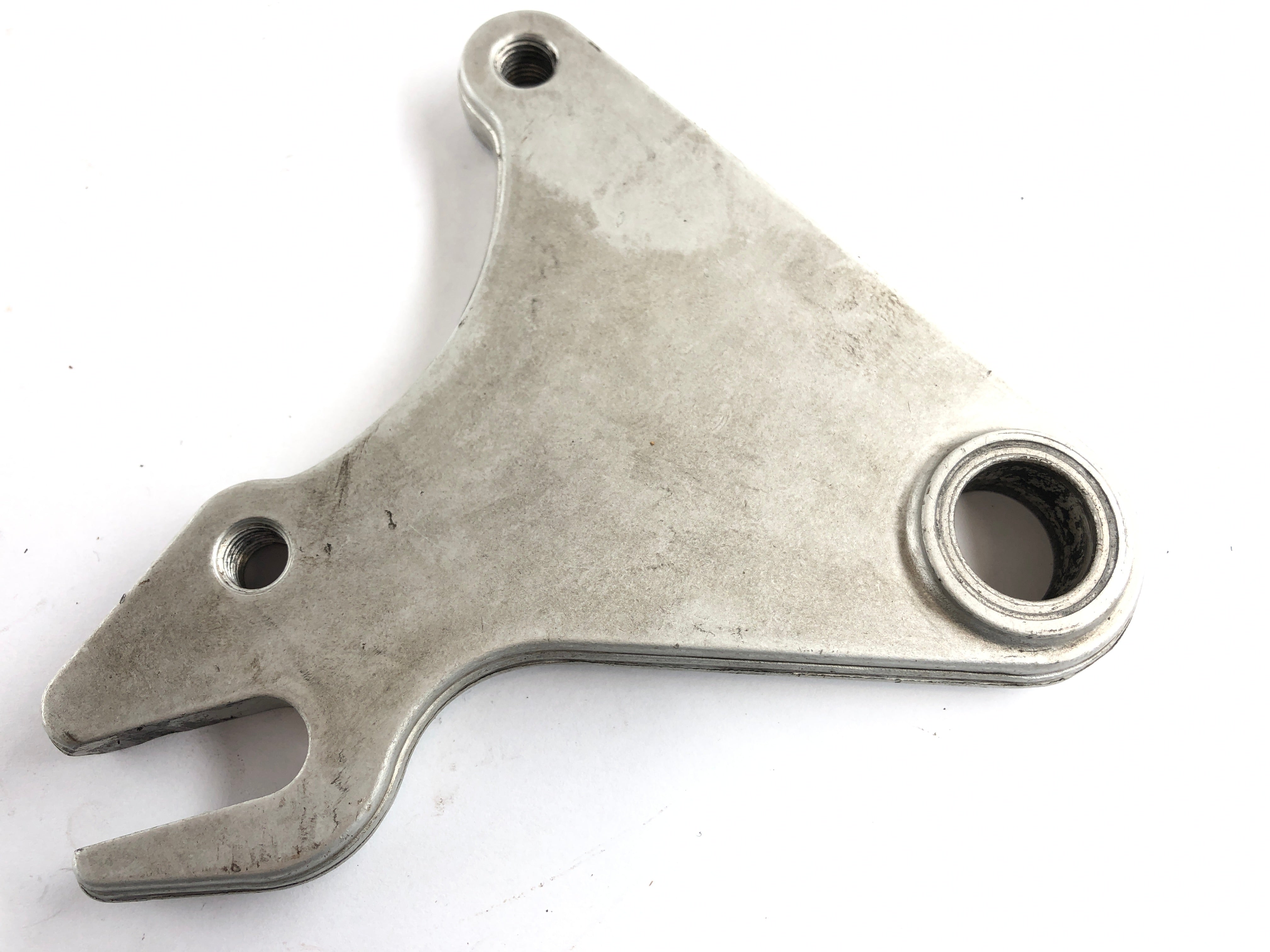 Ducati Paso 750 [1990] - Rear brake caliper anchor plate