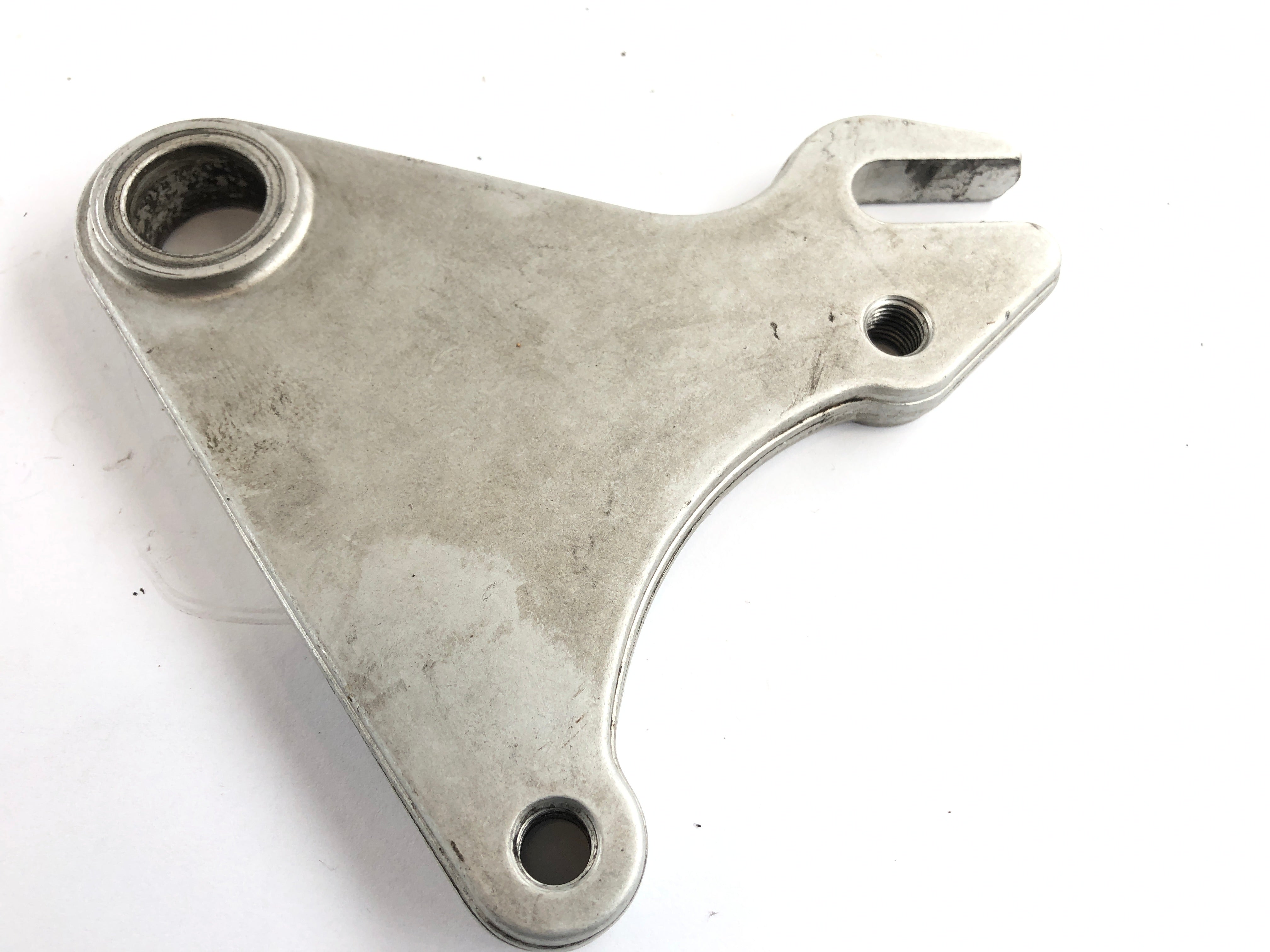 Ducati Paso 750 [1990] - Rear brake caliper anchor plate - 0