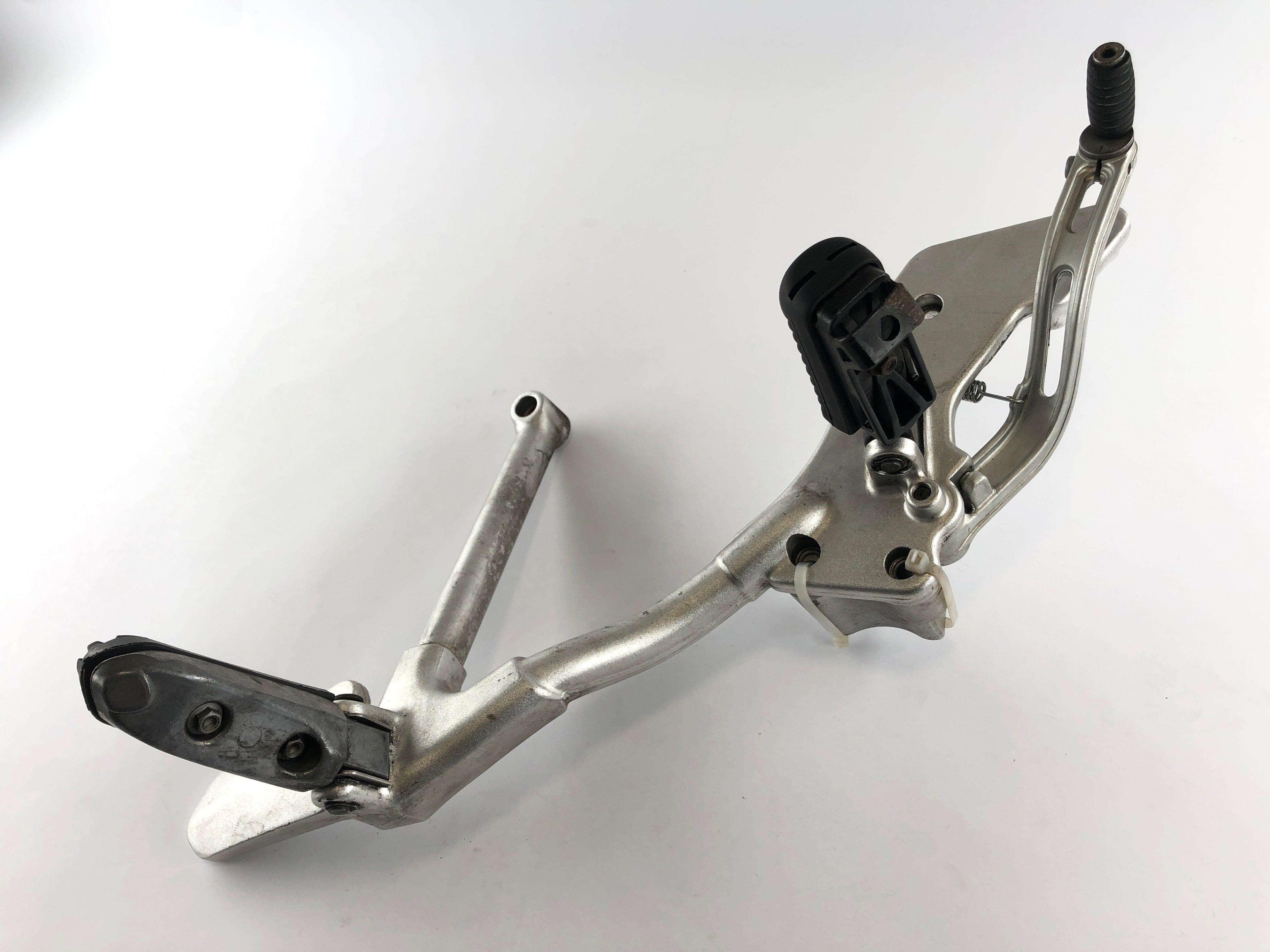 Moto Guzzi Stelvio 1200 8V [2011] - Footrest holder right with brake pedal