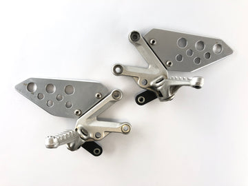 Aprilia RSV 1000 RR Factory [2009] - Водительские ножки с держателем справа и левой сет - 0