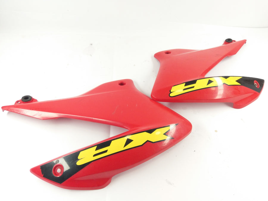 Honda XR 125 L JD19 [2005] - Sidebeklædning til højre og venstre med crack