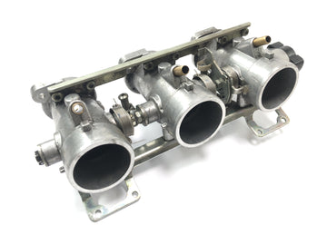 Triumph Speed ​​Triple T509 [1998] - Gasklephuis injectiesysteem injector