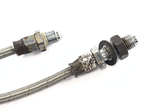 Triumph Bonneville T140V [1976] - Línea de freno en la flexión de acero delantero