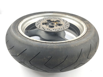 Suzuki GSX R 1100 GV73B [1990] - Achterwielrand aan de achterkant met remschijf en kettingwiel