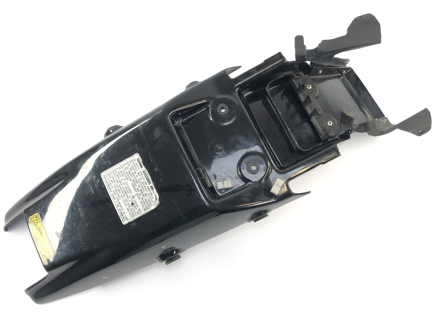 Honda NX 650 RD02 [1989] – galinio pagrindo apdangalas gale centre