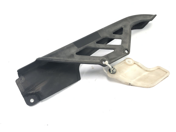 Honda NX 650 RD08 [1995] - Cobertura de orientação da cadeia de proteção à cadeia à esquerda