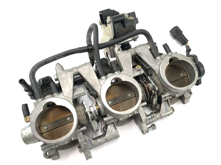 Triumph Street Triple R 675 D67ld [2010] - Injector in de gasklep