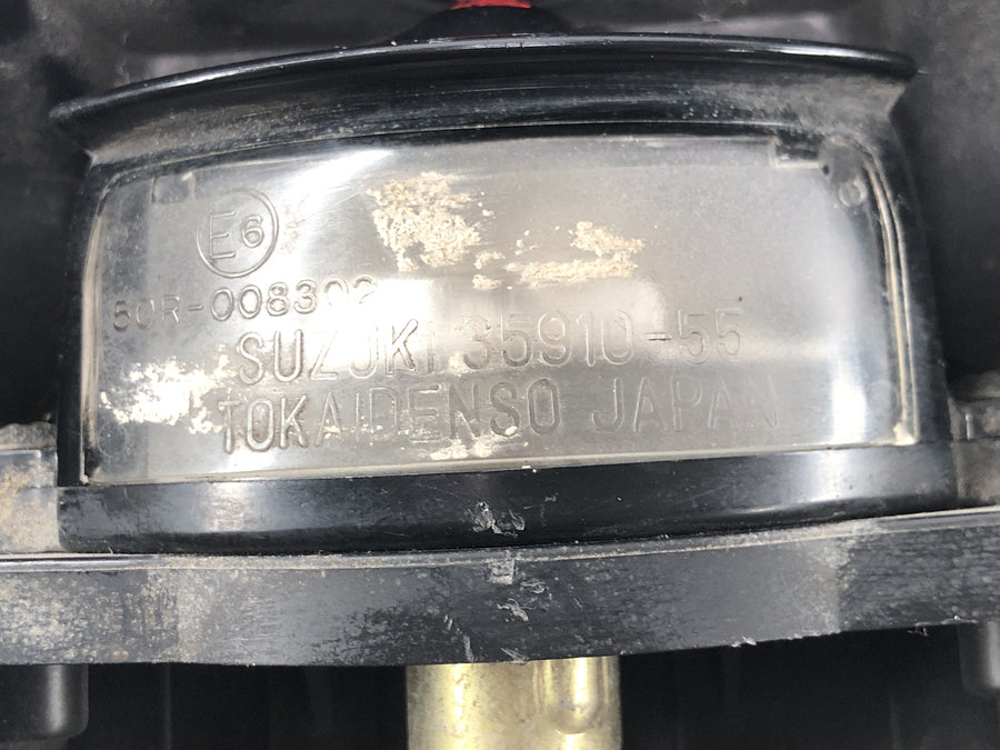 Suzuki RG 250 Gamma GJ21D [1987] - Nummerskiltbelysning med reflektor