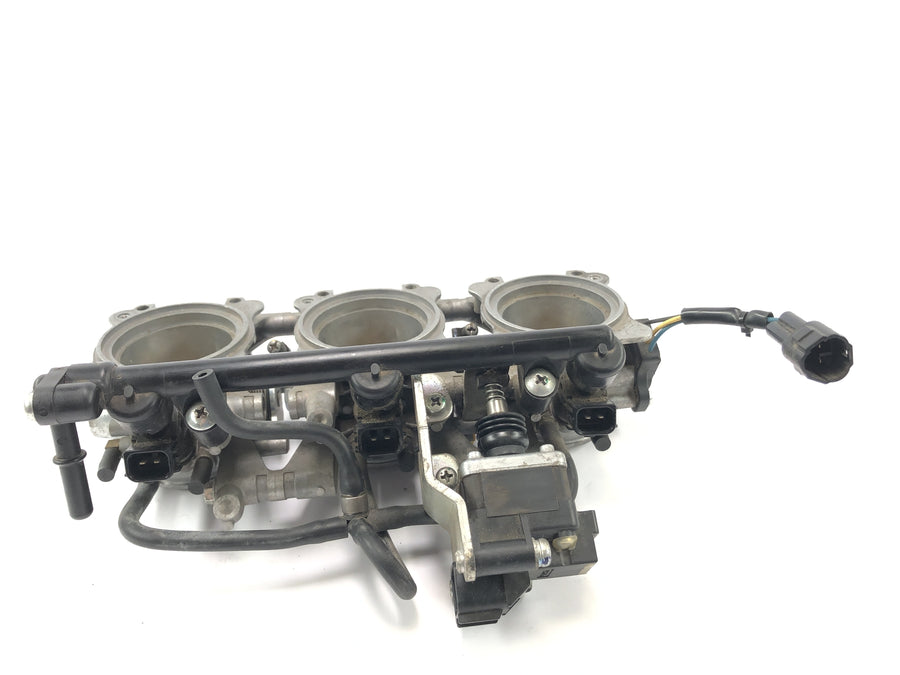 Triumph Street Triple R 675 D67ld [2010] - Injector in de gasklep