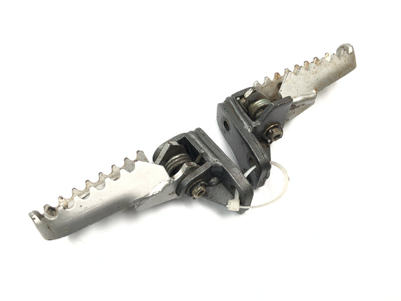 Husqvarna TE 610 E Dual H7 [1999] - Zestaw podnóżków kierowcy z mechanizmem sprężynowym