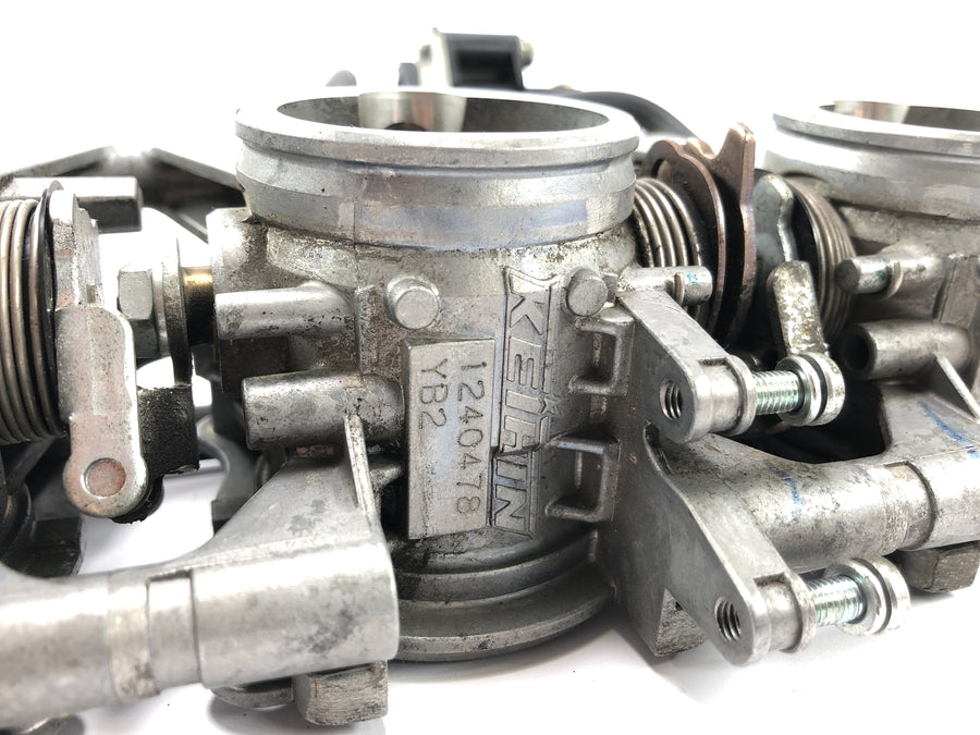 Triumph Street Triple R 675 D67ld [2010] - Injector in de gasklep