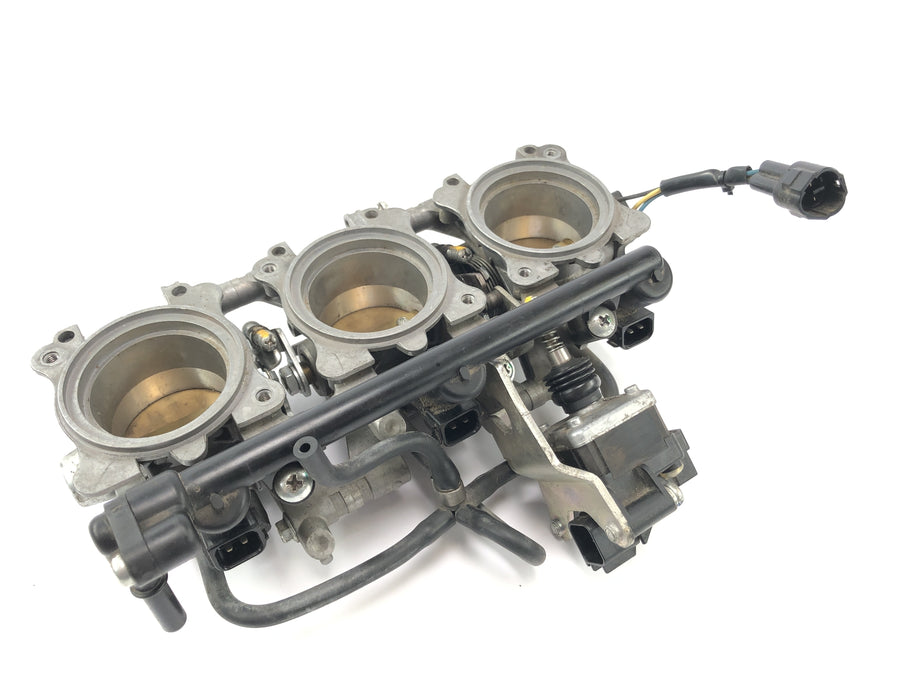 Triumph Street Triple R 675 D67ld [2010] - Injector in de gasklep