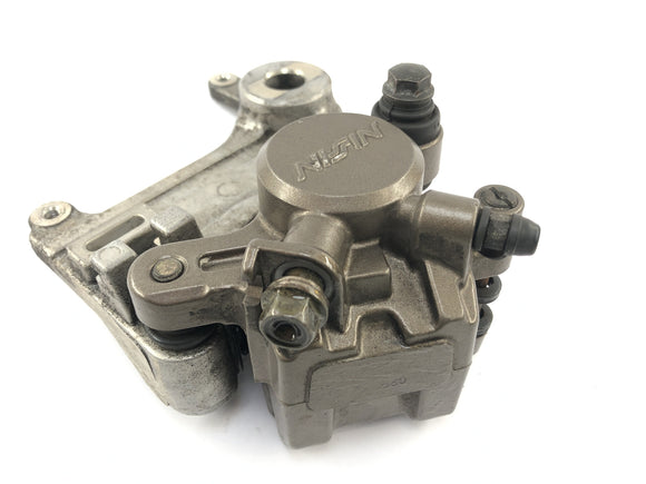 Honda NX 650 RD02 [1989] - тормозный суппорт сзади с якорной пластиной