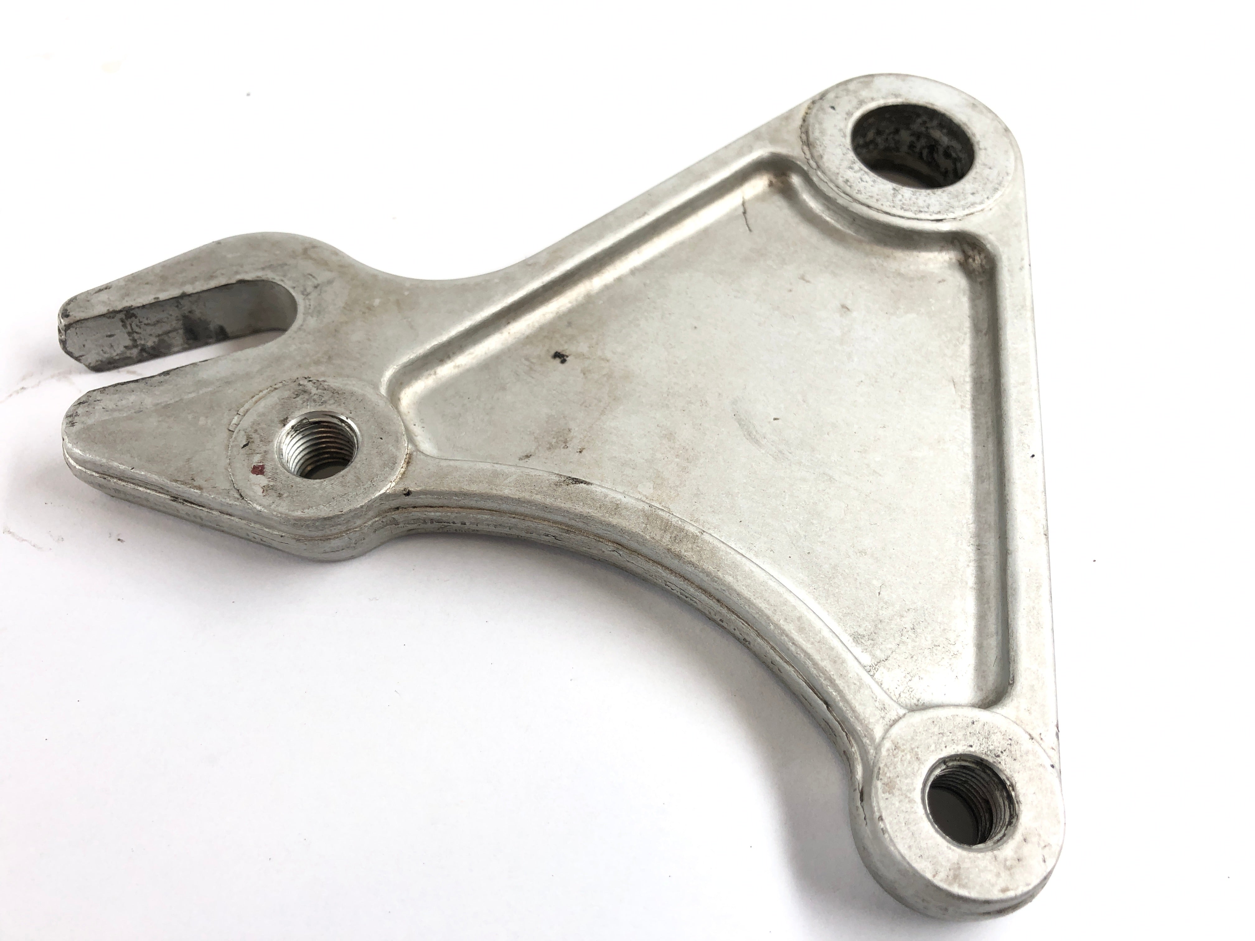 Ducati Paso 750 [1990] - Rear brake caliper anchor plate