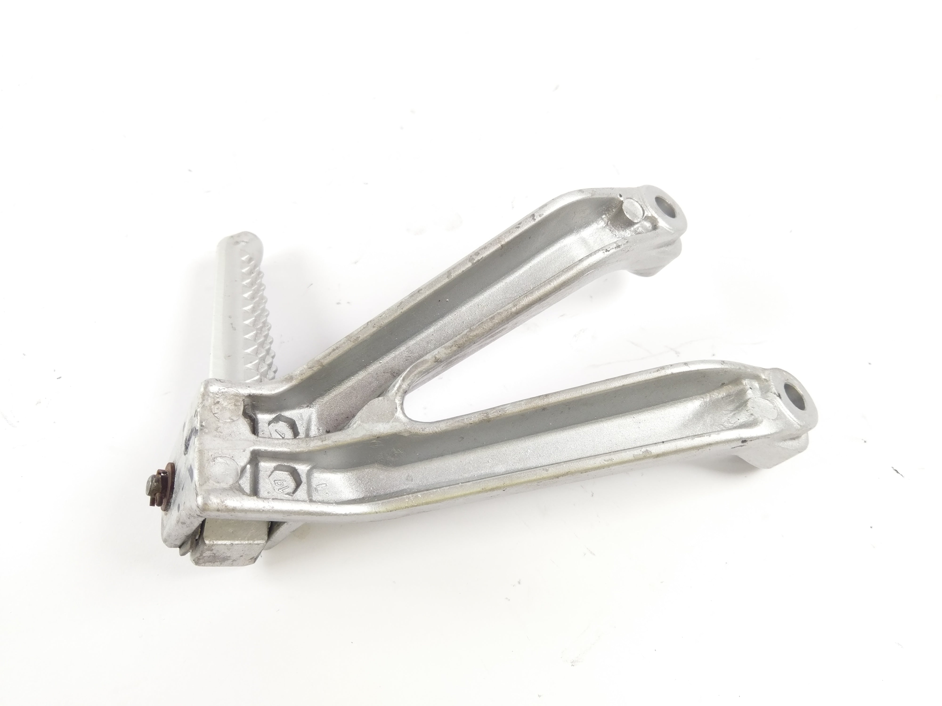 Honda CBR 900 RR Fireblade SC28 [1994] - Zleva Footrest a Halter Socius